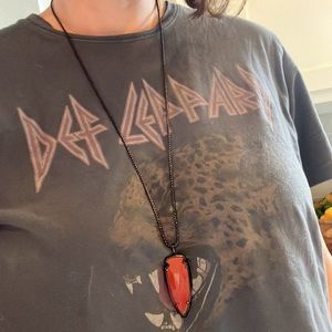 Kendra Scott long burnt orange and black Arrow necklace